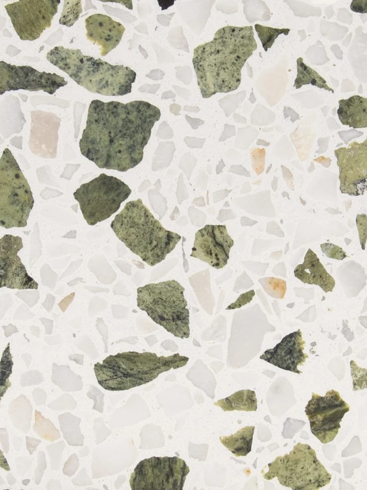 Close-up of terrazzo with green and cream stone chips